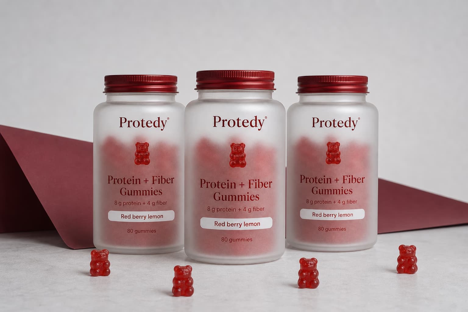Three bottles of PROTEDY Protein and Fiber Gummies arranged together
